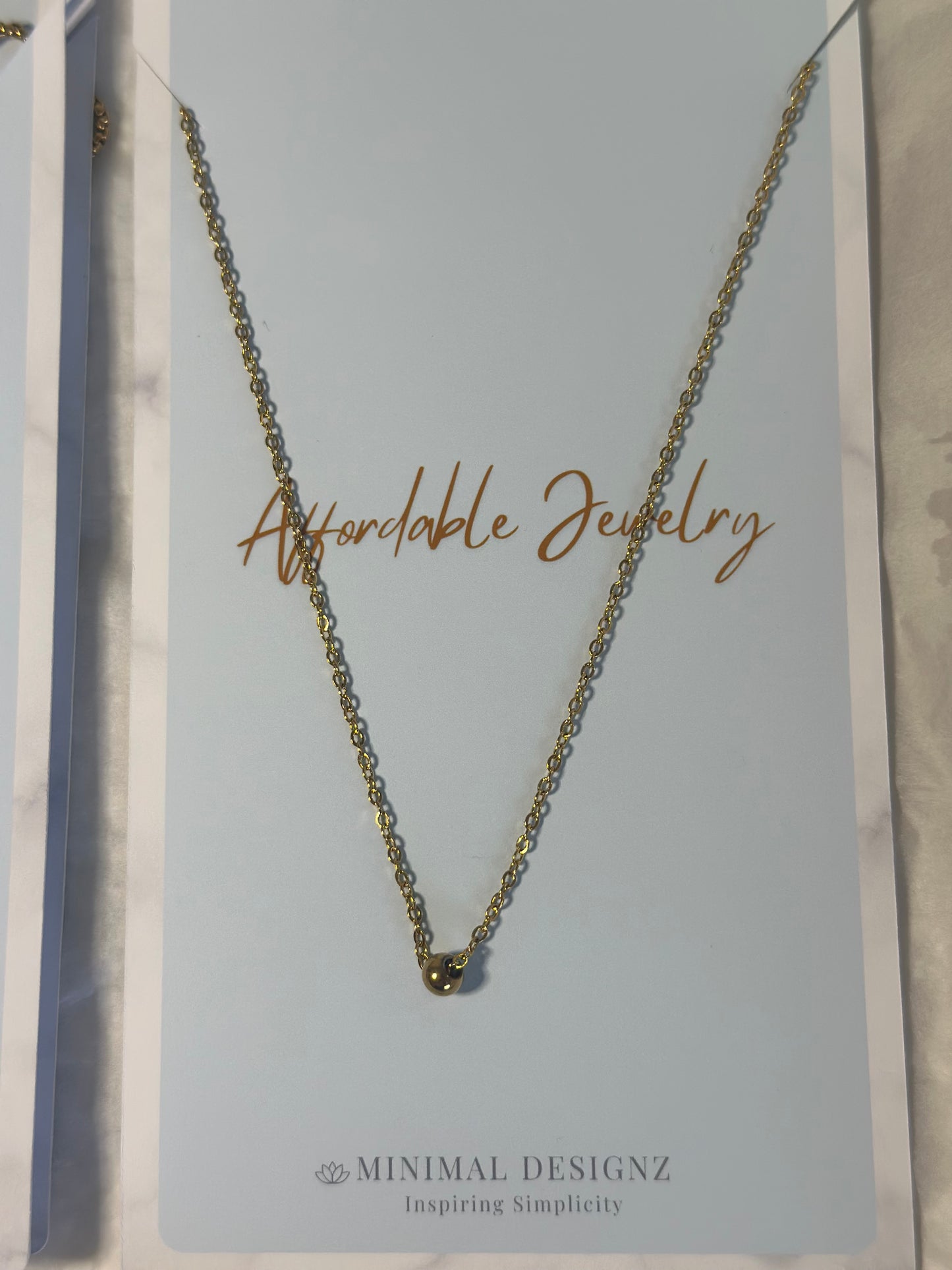 Minimal gold bead necklace