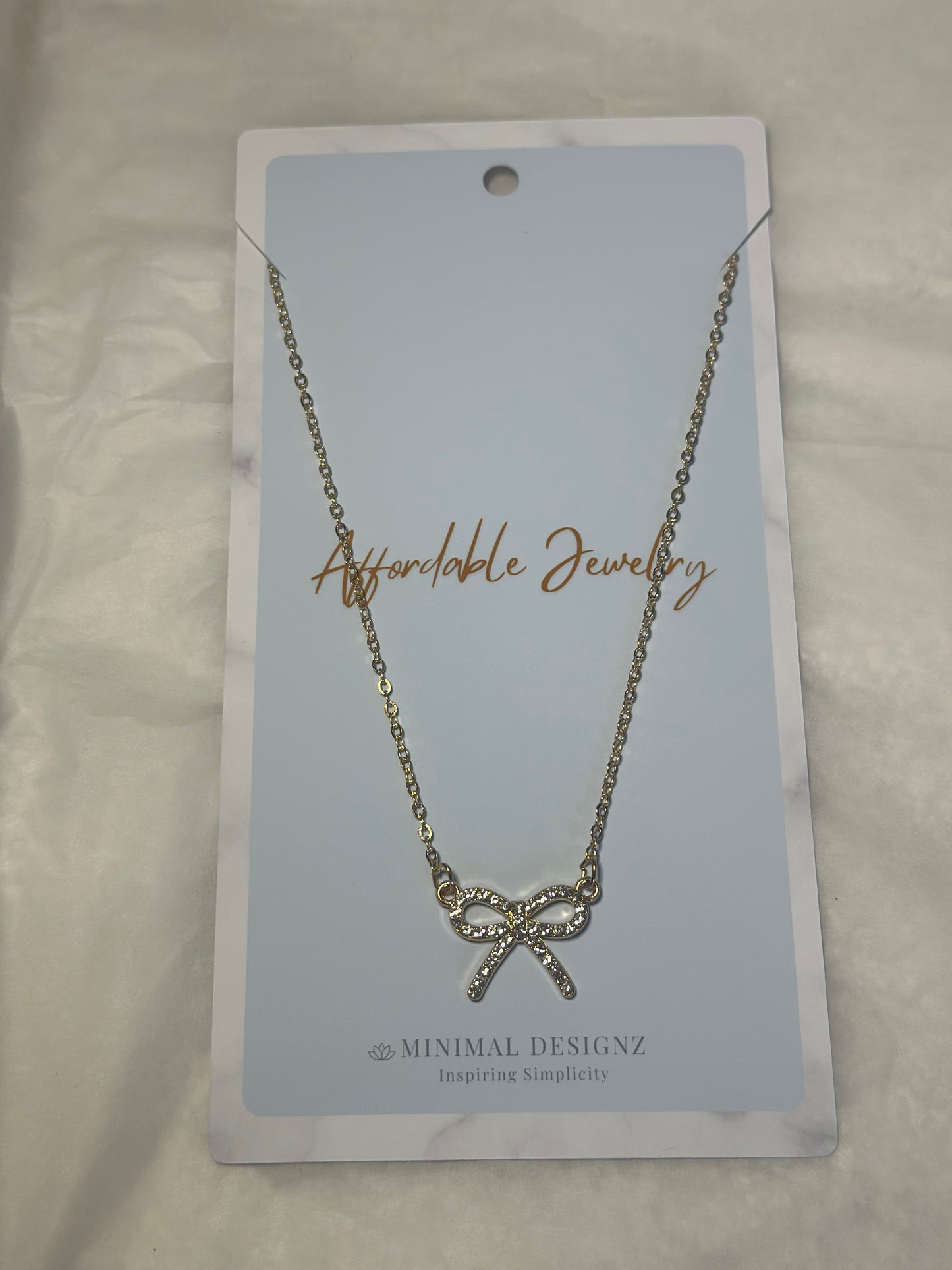 Rhine stone bow necklace