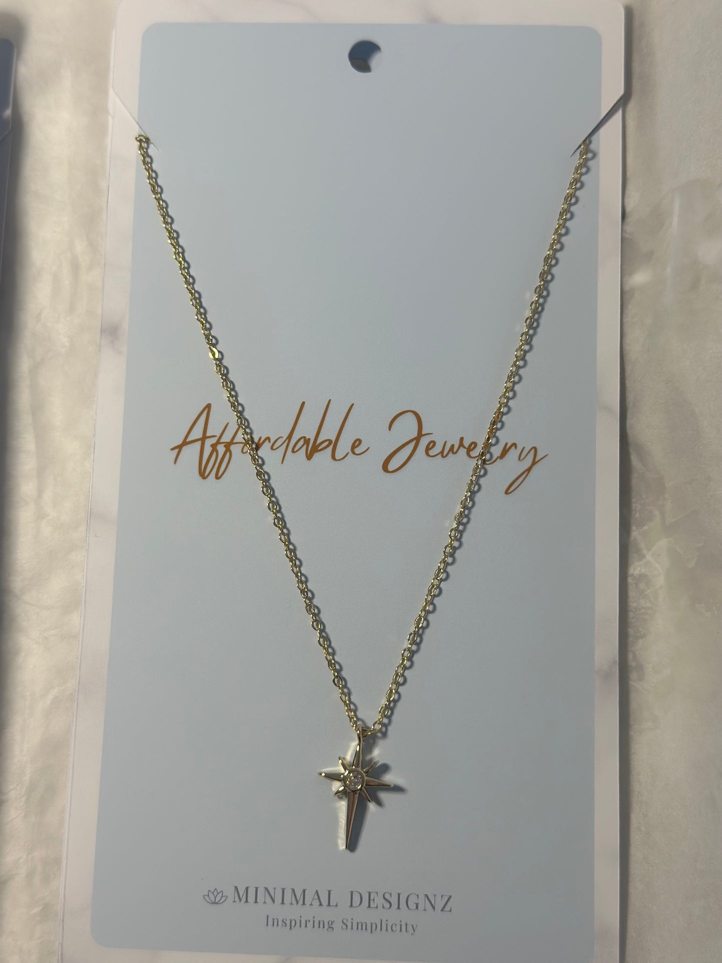 Minimal star necklace