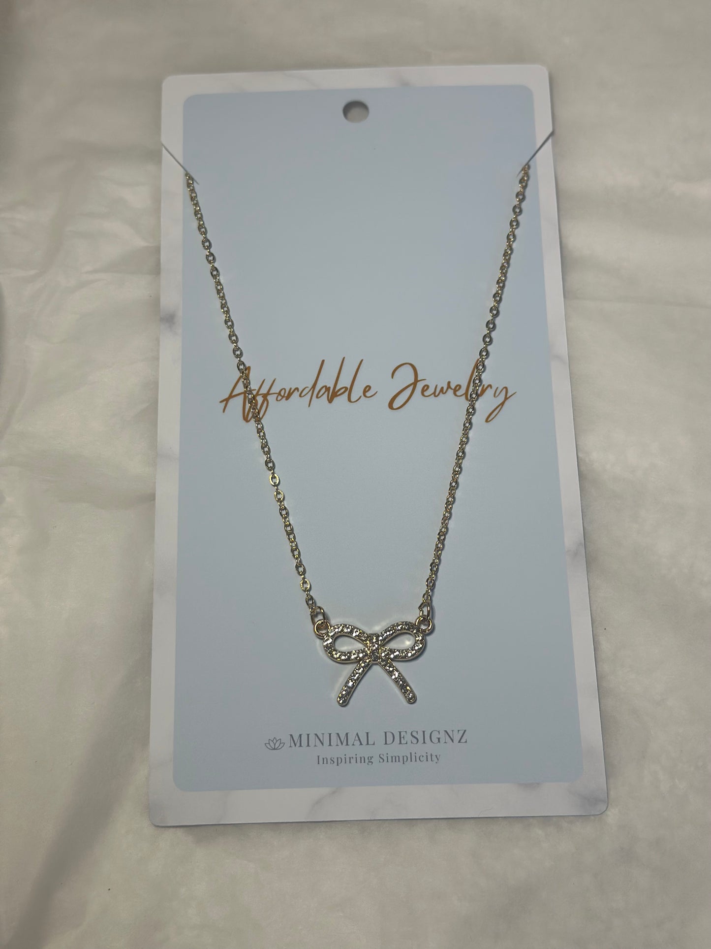 Rhine stone bow necklace