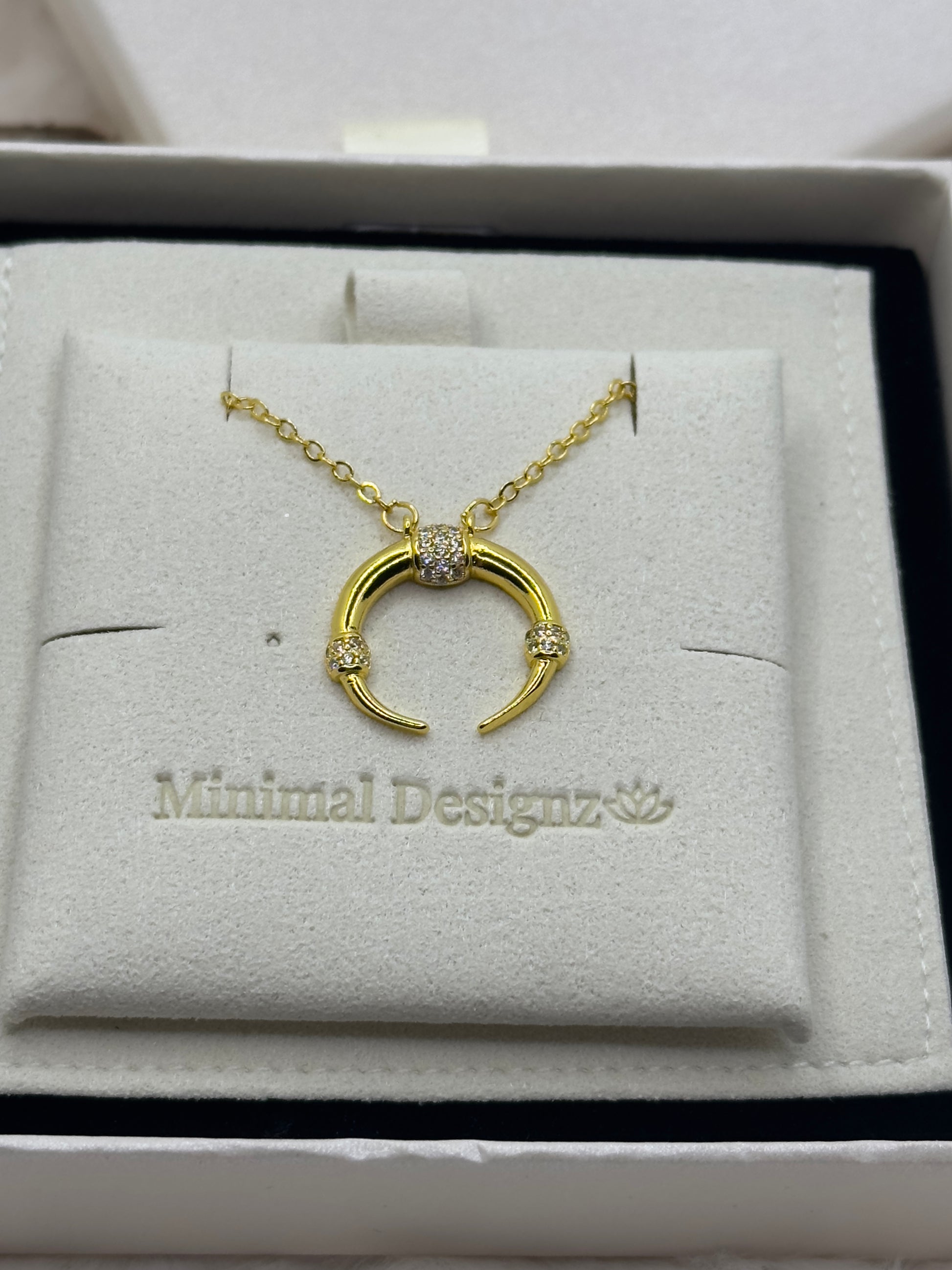 Half moon 18k gold plated gold necklace with rhinestones and beige pouch