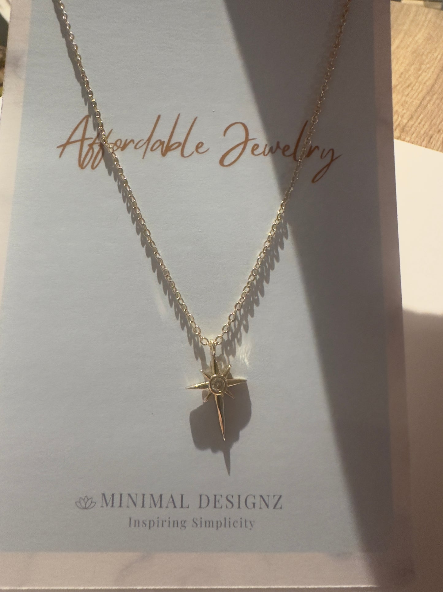 Minimal star necklace