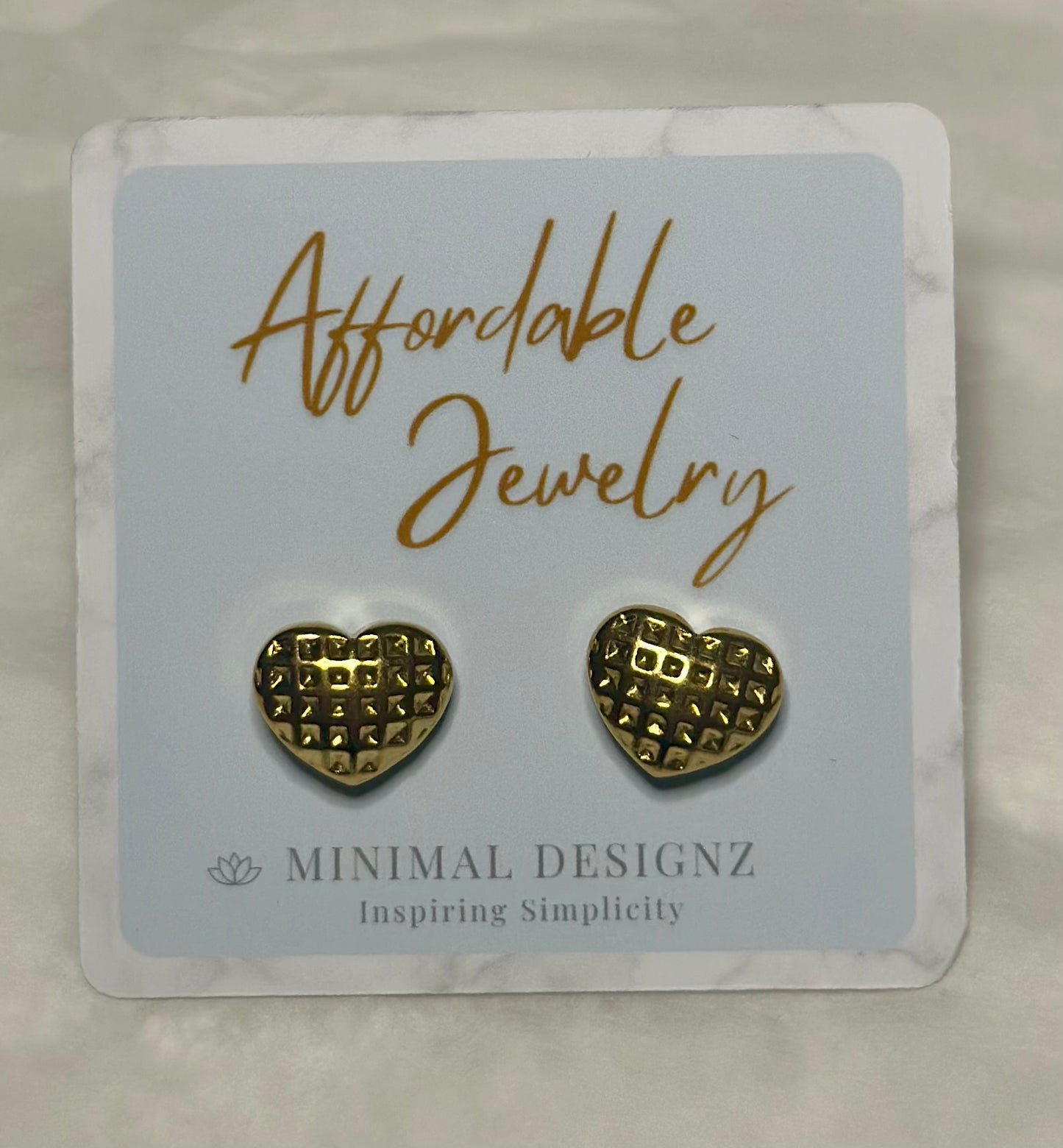 Textured heart stud earrings