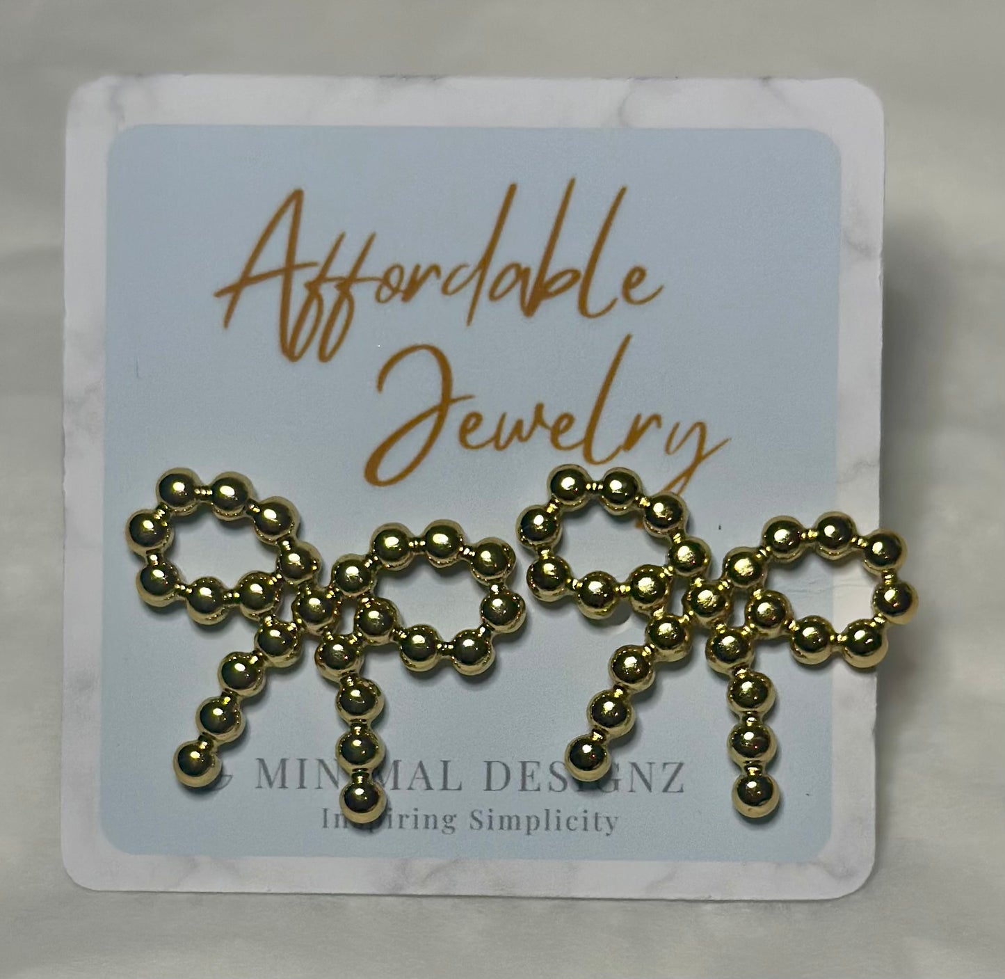 Beaded bow Earring